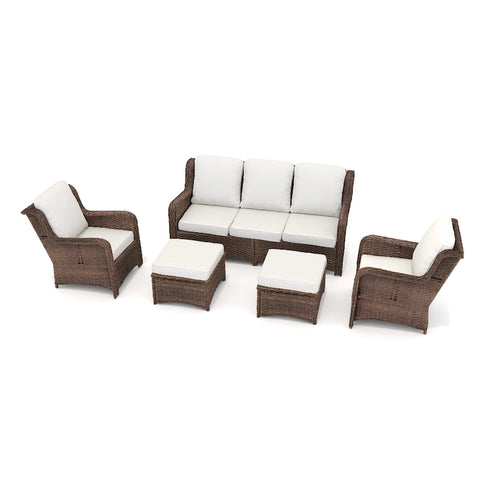 Ensemble de conversation d'extérieur en rotin 5 pièces comprenant un canapé 3 places, 2 fauteuils et des poufs pour terrasse ou balcon.
