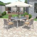 Ensemble de salle à manger d'extérieur en bois pour 4 personnes avec 1 trou pour parasol et coussins amovibles