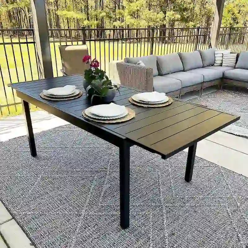 Ensemble de salle à manger 9 pièces, 1 table extensible en métal et 8 chaises en textilène à ressort