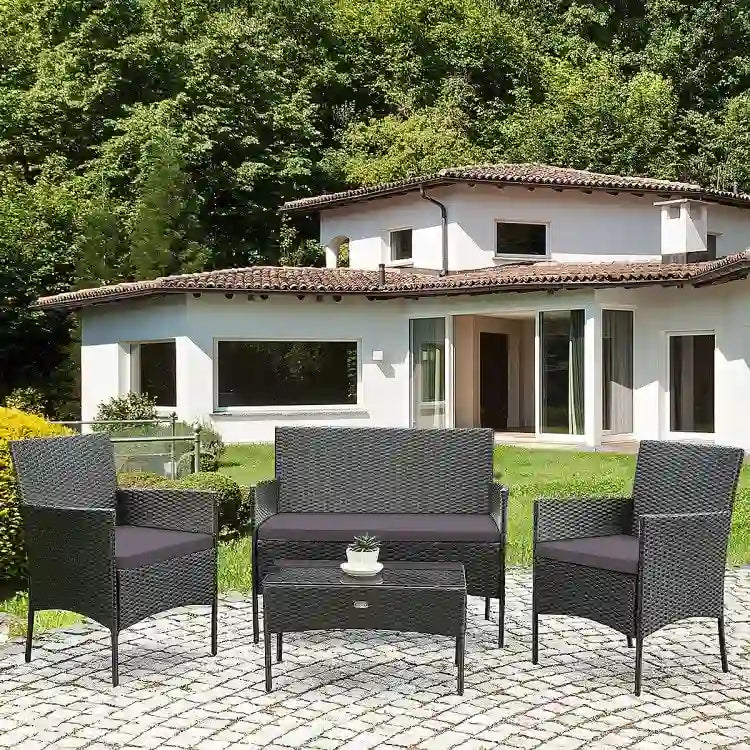 Ensemble de canapé de patio en rotin rembourré 4 pièces avec table basse en verre trempé - 24 x 23,5 x 33 (L x l x H)