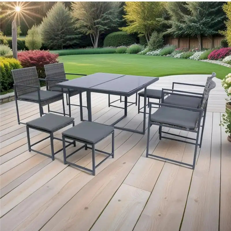 Ensemble de salle à manger d'extérieur 9 pièces avec chaises en rotin et plateau en verre, gain de place.