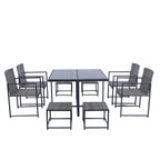 Ensemble de salle à manger d'extérieur 9 pièces avec chaises en rotin et plateau en verre, gain de place.