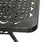 Table rectangulaire élégante en aluminium moulé ajouré, finition bronze antique (71).