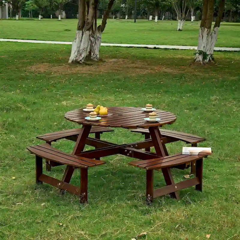 Table de pique-nique ronde d'extérieur pour 8 personnes avec 4 bancs intégrés et trou pour parasol.