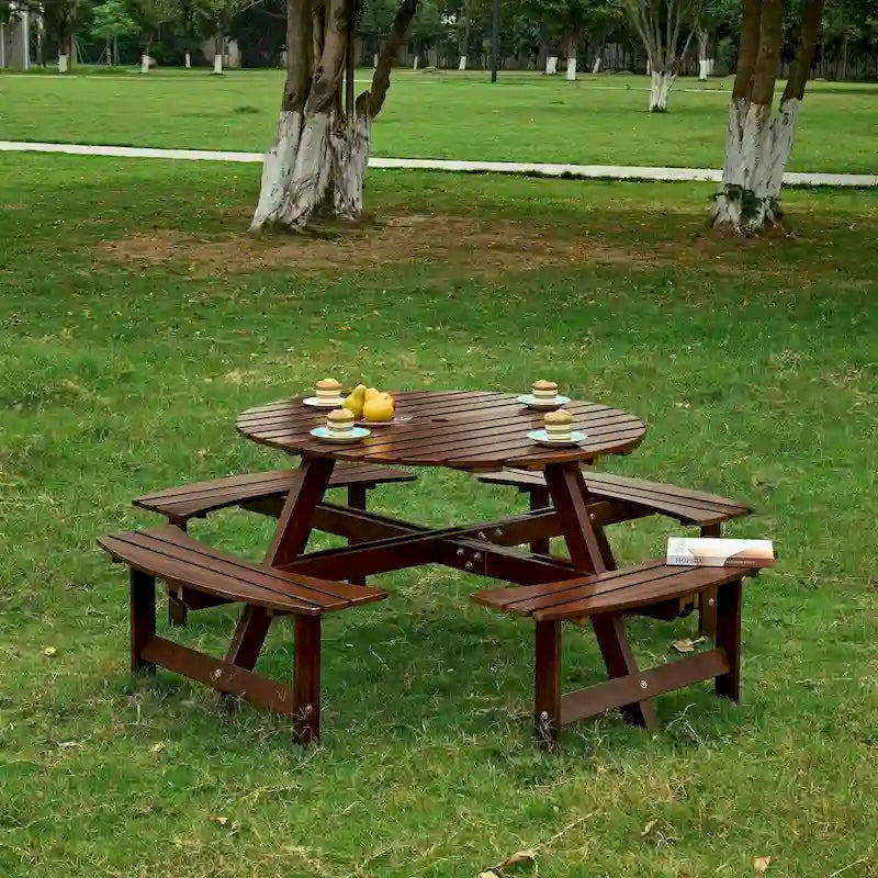 Table de pique-nique ronde d'extérieur pour 8 personnes avec 4 bancs intégrés et trou pour parasol.